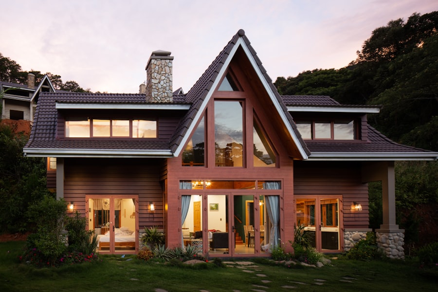 Twilight exterior photography of a home with warm interior lighting at dusk